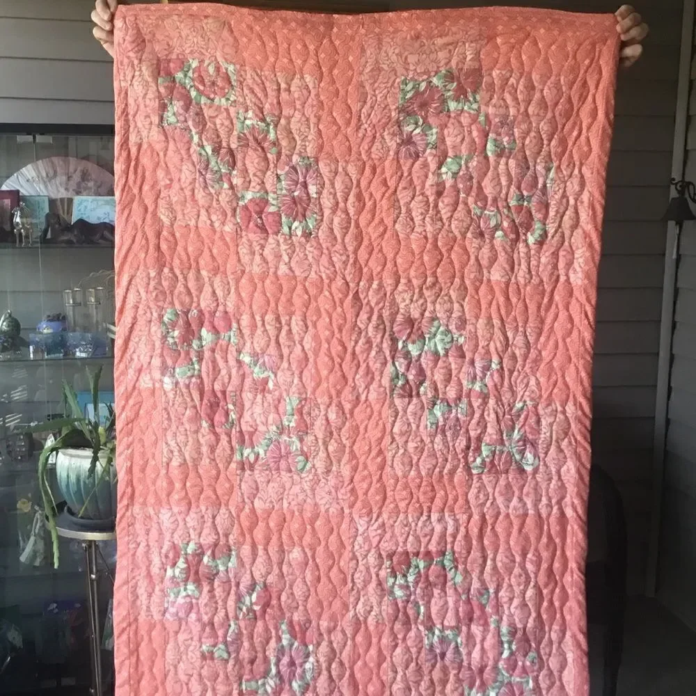 NWT. Hand Crafted Quilt in Corals